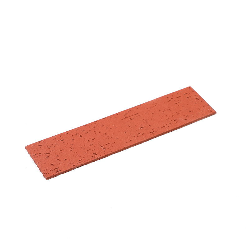 Installation and adhesive coverage check for flexible clay brick cladding